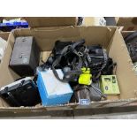 A box of cameras and equipment