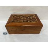 A yew wood jewellery or work box, the lid diaper inlaid in burr yew and mother-of-pearl. 12' wide.