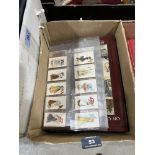 A box of cigarette cards