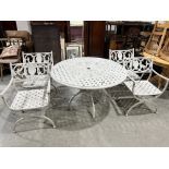 A white painted metal garden table, 45' diam; with a set of four chairs