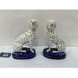 A pair of 19th century Staffordshire dalmations with gilded collars; lockets and chains. 5' high