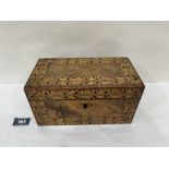 A Victorian walnut tea caddy with banded inlay in various woods. 9' diam.