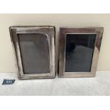 Two silver photograph frames, the plain example of recent manufacture. Both 7' high