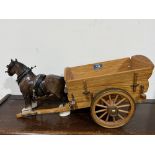 A Beswick shire horse and oak cart. 21' long