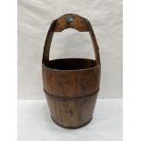 A Chinese hardwood well bucket. 24' high