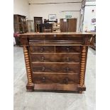 A Victorian Scottish mahogany chest with ogee long drawer over two short and three long drawers