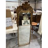 A George I style pier glass, the foliate moulded frame with shell surmount and shaped plate. 62½'