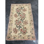 A Kashmiri wool stitched chain rug, 1.47m x 0.88m