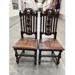 A pair of 19th century oak Carolean style oak chairs. (One with broken pilaster to back)