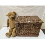 A mid-20th century gold plush teddy bear with growler, 28' high; the lot to include a wicker hamper