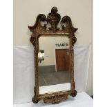 A George I style gilt pier glass with bevelled plate. 50'h x 25½'w