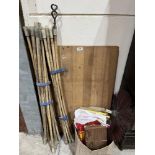 A quantity of chimneysweep's rods, brush, table top and a box of sundries