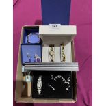 A collection of costume jewellery and cocktail watches