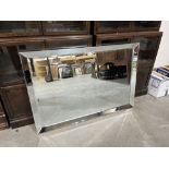 A contempory style wall mirror. 32' x 48'