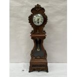 An early 20th century French walnut and gilt metal mounted miniature longcase timepiece, the brass