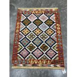 A Choli Kilim rug. 1.16m x 0.86m