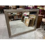 A silvered reeded frame wall mirror with bevelled plate 44' x 55'