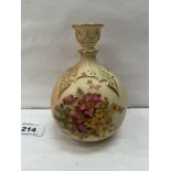 A Worcester blush ivory globular vase, painted with summer flowers in enamels and enriched with