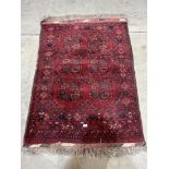 A red ground eastern rug. 60' x 42'