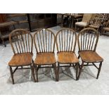 A set of four stickback chairs on turned splayed legs