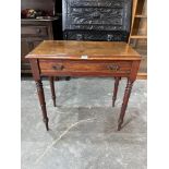 An Edward VII mahogany side table on ring turned legs. 29' wide