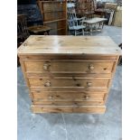 A pine chest of three drawers. 36' wide