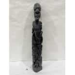 An African carved ebony wood sculpture, man with attendant children. 21½' high