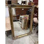 A gilt framed wall mirror with bevelled plate. 42' x 30'
