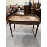 A George IV mahogany washstand with frieze drawer on turned tapered legs. 40' wide