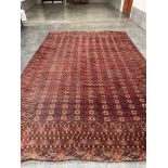 A red ground eastern carpet. 190' x 123'