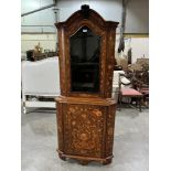 A 19th century marquetry standing corner cabinet. 72' high