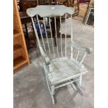 A painted stickback rocking chair