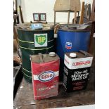 Four automative oil cans