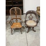A Victorian Windsor elbow chair and a Victorian mahogany office chair with caned seat. (A.F.)
