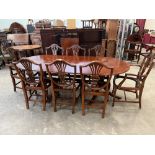 A Regency style yew veneered extending dining table and eight shield back chairs, the lot to include