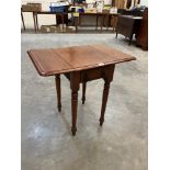 A 19th century mahogany Pembroke table with frieze drawer on turned legs. 18½' wide