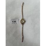 A 9ct cased lady's wristwatch with plated bracelet