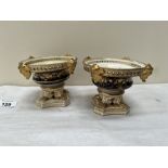 A pair of Bloor Derby pot-pourri vases, the squat Campana shaped bodies richly gilded with foliage