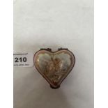 A French Sevres style heart form pill-box, the lid painted with two putti. Spurious Sevres mark to