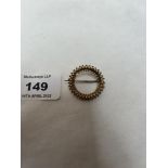 A rope twist brooch. Apparently in gold but unmarked. 4g