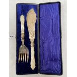 A Victorian cased plated and carved mother-of-pearl handled fish slice and fork