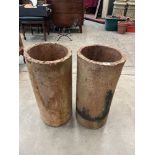 A pair of terracotta cylindrical chimney pots. 24' high