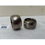 A pair of silver bright cut foliate decorated napkin rings. Maker's mark P.S. (Paul Storr?) 2ozs