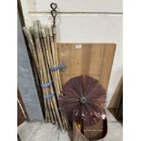 A quantity of chimneysweep's rods, brush, table top and a box of sundries