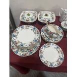 A Royal Cauldon Victorian pattern part dinner service of 25 pieces