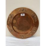 An Art-Nouveau Carl Deffner Jugendstil copper dish, repousse decorated with stylised foliage.