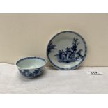 Nanking Cargo. A blue and white teabowl and saucer. 18th century. Christie's labels to bases