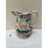 A 19th century Staffordshire pink lustre and polychrome jug, moulded with a stag and two fawns among