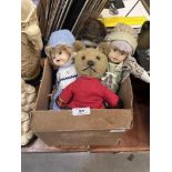 Three dolls and a teddy bear