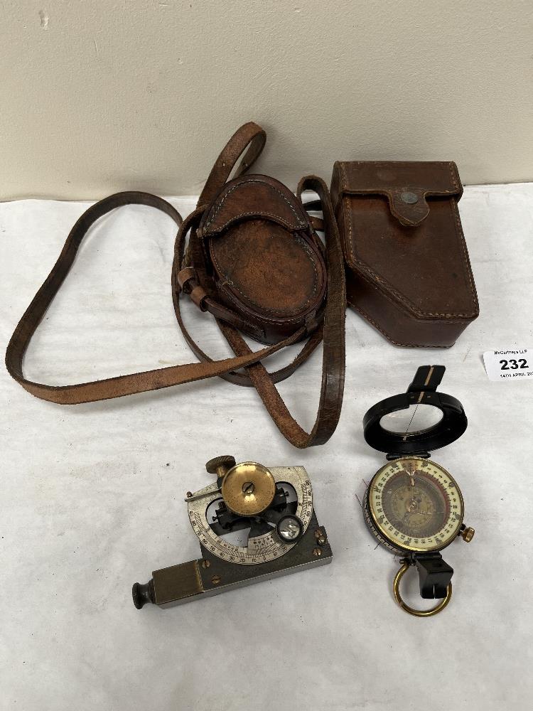 A small brass sextant by E.R. Watts, London and a WWI military marching compass. Both leather cased